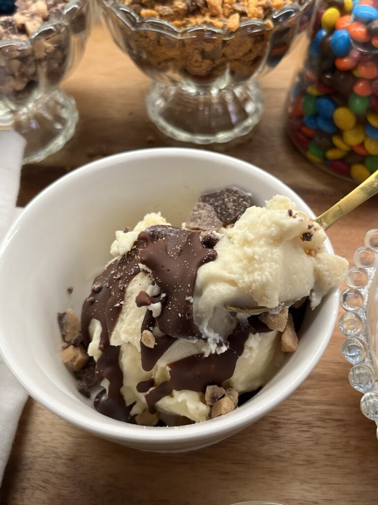 Classic Vanilla Bean Ninja CREAMi ice cream topped with chocolate shell and toffee pieces