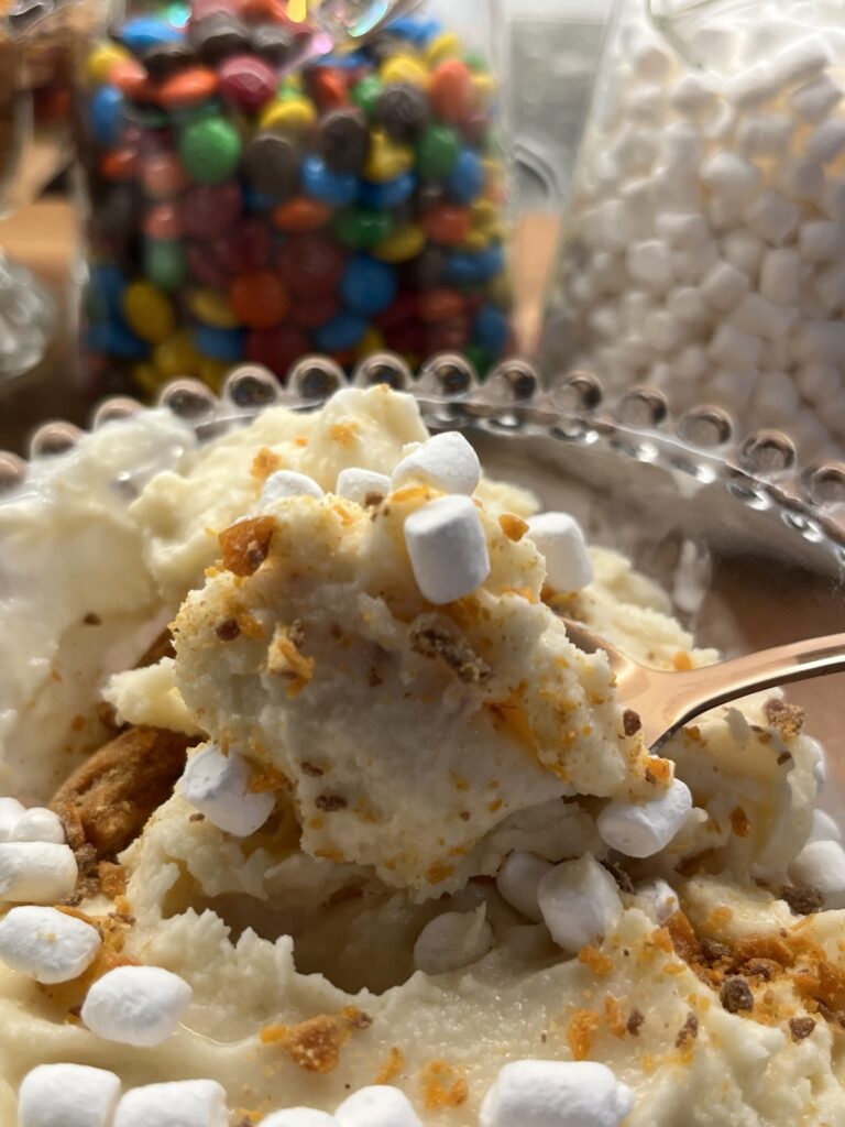 Classic Vanilla Bean Ninja CREAMi ice cream topped with mini marshmallows and crushed cookies