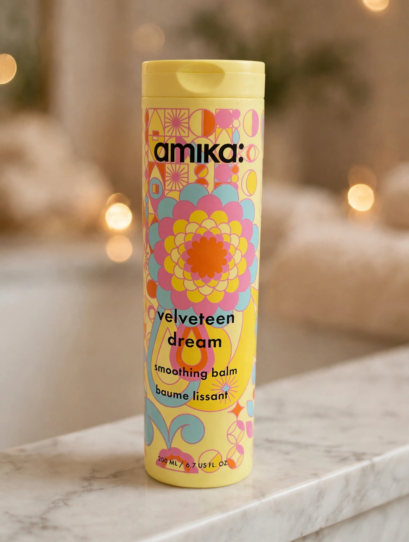 amika Velveteen Dream Smoothing Balm bottle on a bathroom counter
