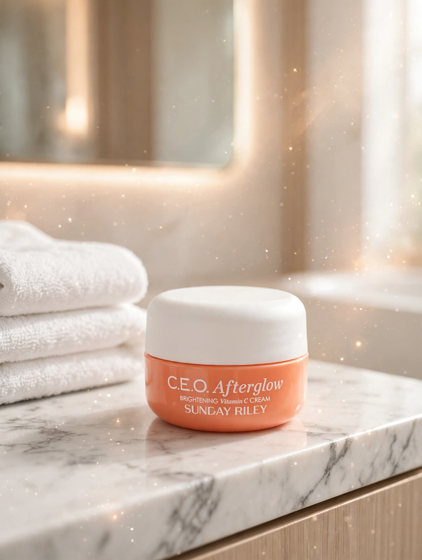 Sunday Riley C.E.O. Afterglow Brightening Vitamin C Cream jar on a marble bathroom counter
