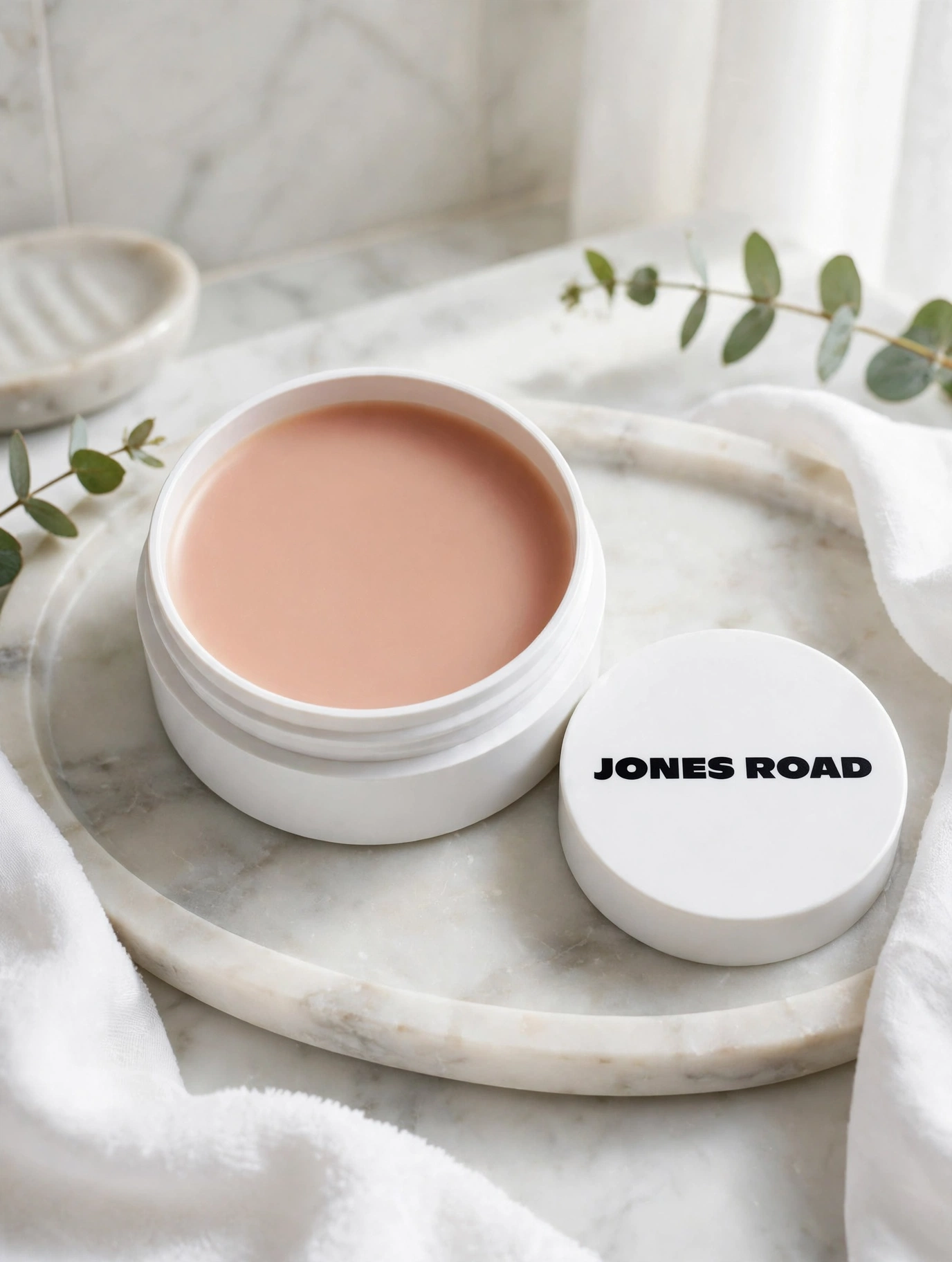 Jones Road Miracle Balm open jar in Au Naturel